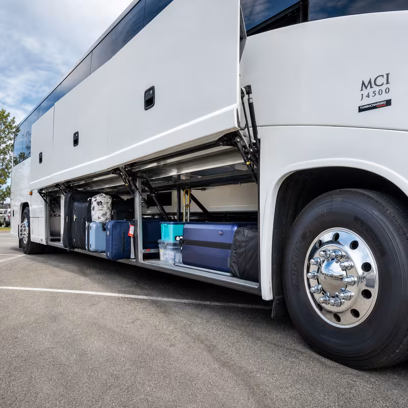 Party bus interior with wraparound leather seating and LED lighting in Coral Springs