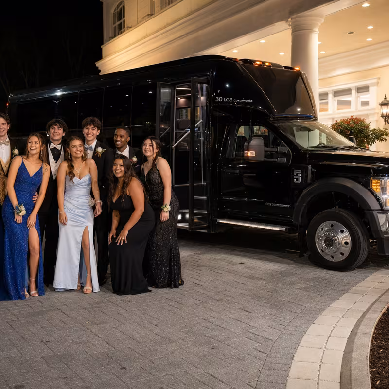 Party bus interior with wraparound leather seating and LED lighting in Coral Springs
