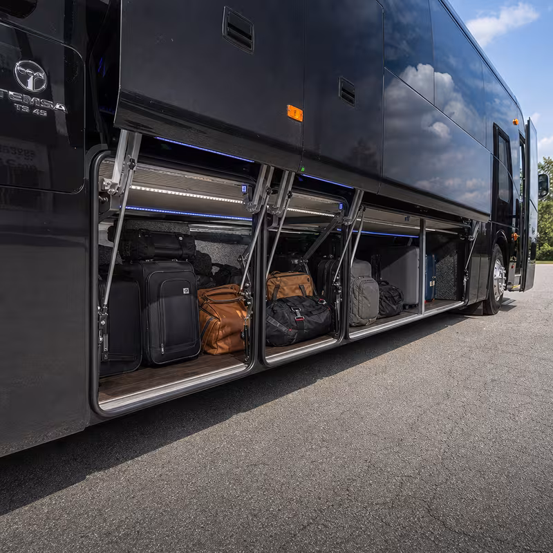 Party bus interior with wraparound leather seating and LED lighting in Coral Springs
