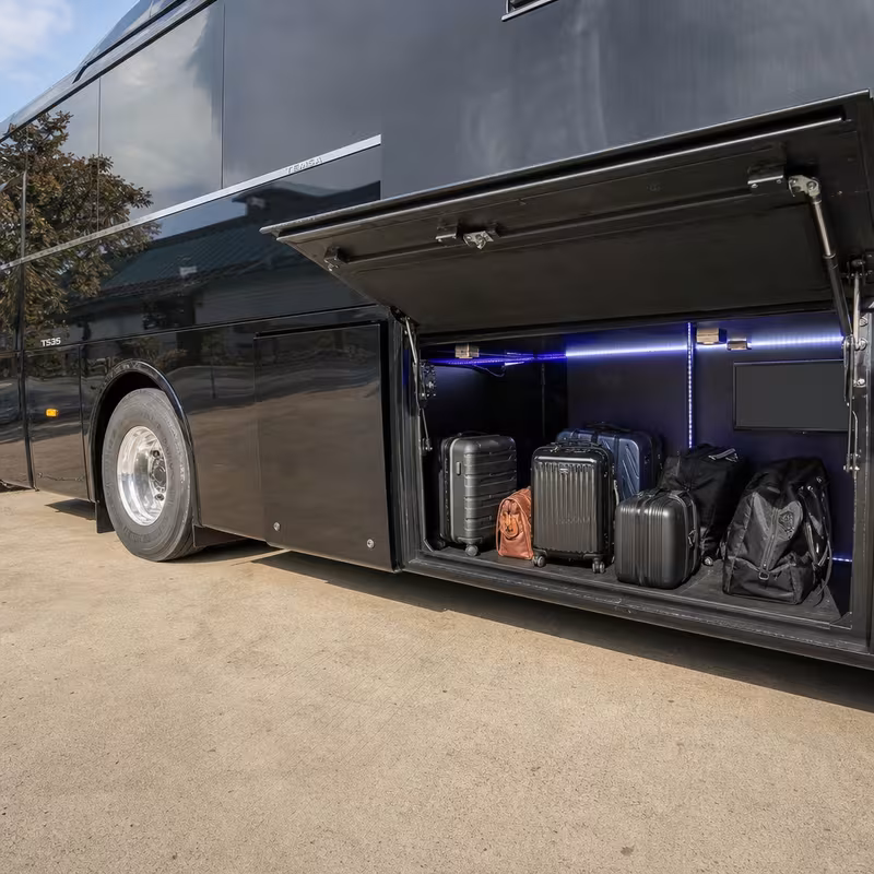 Party bus interior with wraparound leather seating and LED lighting in Coral Springs