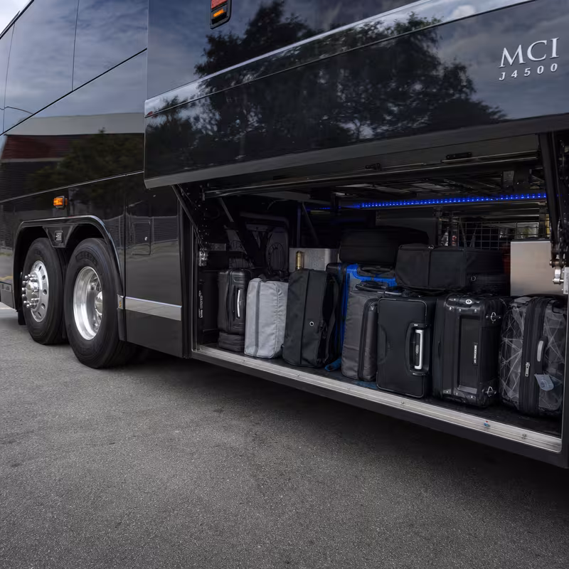 Party bus interior with wraparound leather seating and LED lighting in Coral Springs